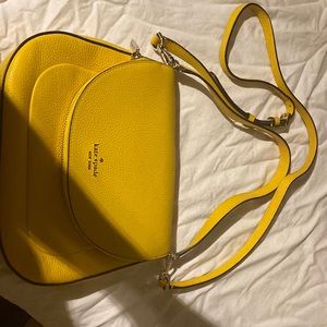 Kate Spade crossbody yellow and Tan on the inside never used